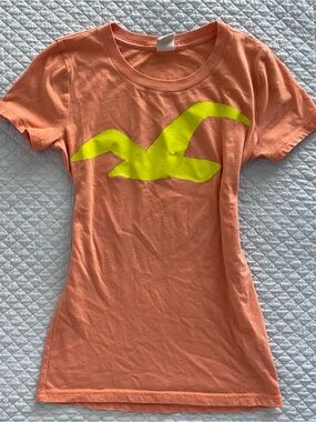 Hollister Coral Orange Short Sleeve Tee with Yellow Logo